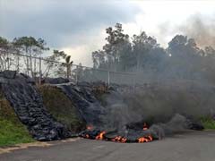 Lava Burns Asphalt at Edge of Hawaii Town