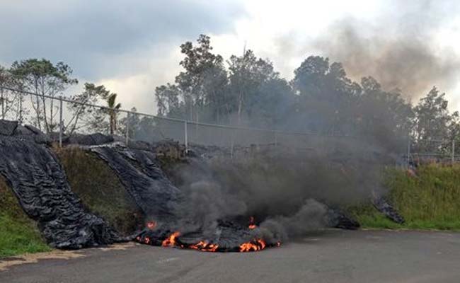 Lava Burns Asphalt at Edge of Hawaii Town 