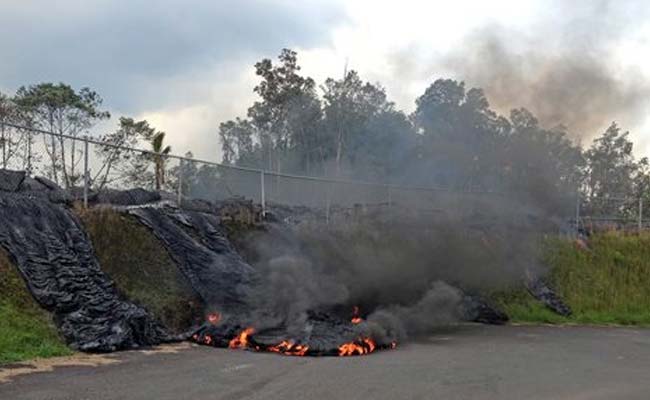 Lava Burns Asphalt at Edge of Hawaii Town