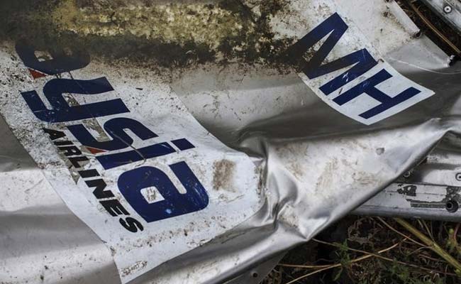 Six Coffins of MH17 Remains Flown Out of Ukraine