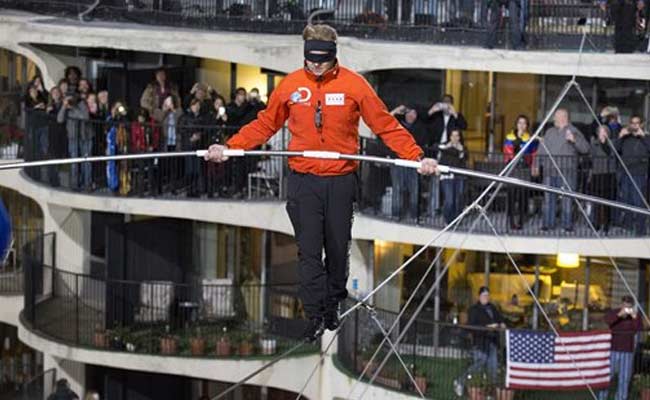 On a Tightrope Between Skyscrapers. No Safety Net. Blindfolded.