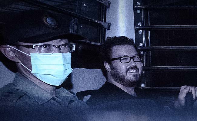 UK Banker on Double Murder Charge Grins Leaving Hong Kong Court