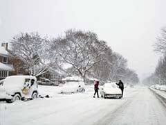 Early Winter Pummels Much of US, Strands Cars