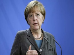 Angela Merkel Joins Holocaust Survivors to Mark Nazi Camp's Liberation Angela Merkel Joins Holocaust Survivors to Mark Nazi Camp's Liberation