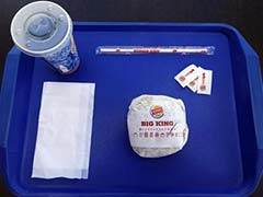 $100,000 Found in Bag at Burger King Outlet Owned by Indian