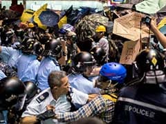 Street Clashes Break Out as Hong Kong Clears Part of Protest Zone