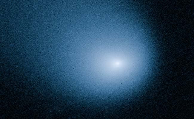 Bright Specks of Comet Dust Light Up Martian Sky