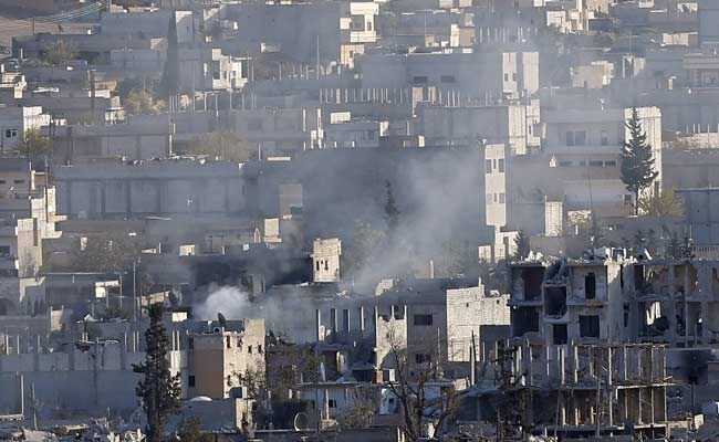 Kurds Seize Islamic State Arms, Buildings in Besieged Town: Monitor Kurds Seize Islamic State Arms, Buildings in Besieged Town: Monitor