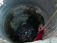 Children Skip School to be Lowered into Wells to Fetch Water