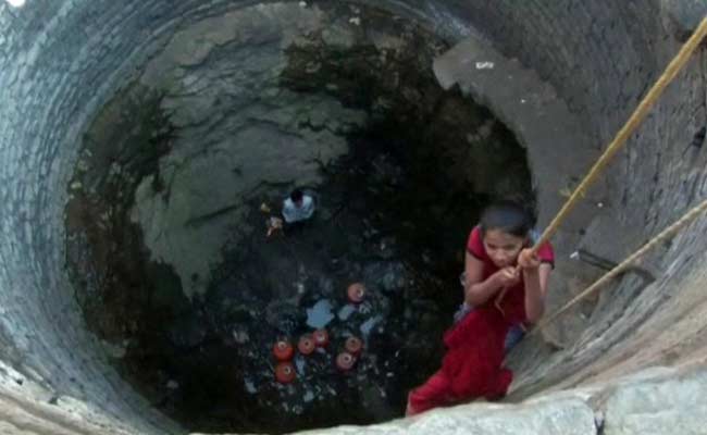 Children Skip School to be Lowered into Wells to Fetch Water