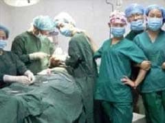 Selfies by Medical Staff in Operating Theatre, Patient Unconscious