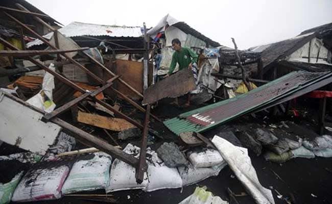 Philippine Typhoon Weakens But Leaves 21 Dead 