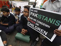 Burying the Dead After Pakistan's School Massacre