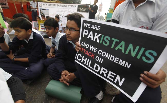 Burying the Dead After Pakistan's School Massacre