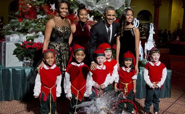 The Obamas Get Into Holiday Spirit At Benefit Concert