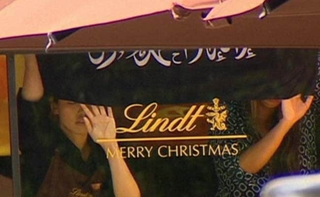 Sydney Hostage Crisis: Dozens Held Inside Cafe, Islamic Flag Put Up on Window