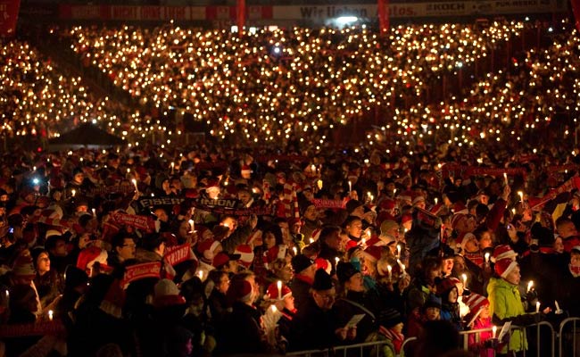 Berlin Club Swaps Floodlit Football for Candle-lit Carols