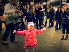 Stop Whatever You're Doing and Watch This Little Girl Start a Public Dance Party