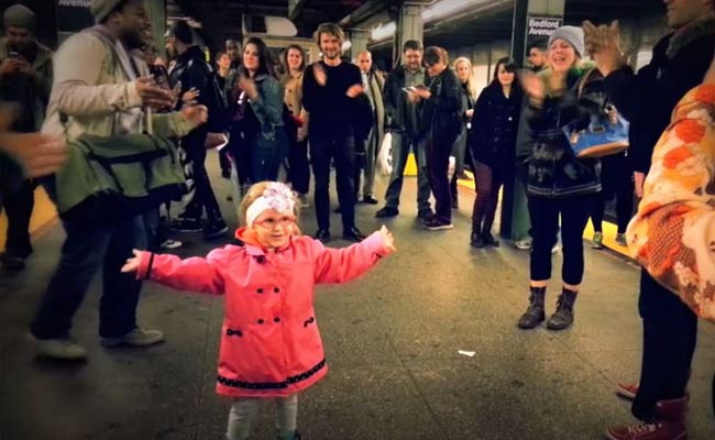 Stop Whatever You're Doing and Watch This Little Girl Start a Public Dance Party