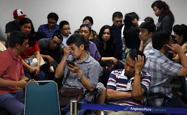 Restless Night Awaits Relatives of Passengers on Missing AirAsia Plane