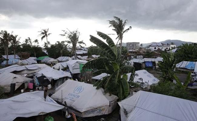 Rains Lash Disaster-Weary Philippines As Typhoon Nears 