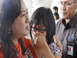 AirAsia Victim With Life Jacket Raises Questions About Plane's Last Moments AirAsia Victim With Life Jacket Raises Questions About Plane's Last Moments