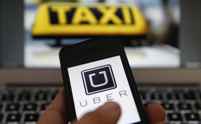 Taxi Service App Uber Defies Ban in Spain