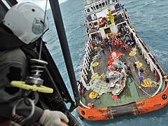 Crashed AirAsia's Tail Hoisted From Sea in Search of Black Boxes