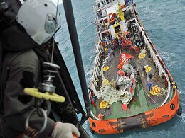 Crashed AirAsia's Tail Hoisted From Sea in Search of Black Boxes Crashed AirAsia's Tail Hoisted From Sea in Search of Black Boxes