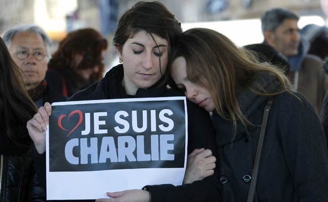 Scared But Defiant: Cartoonists Raise Pencils to Charlie Hebdo