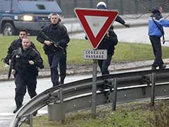 Charlie Hebdo Attack: Suspects Holding At Least One Hostage