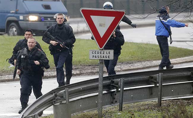 Charlie Hebdo Attack: Suspects Holding At Least One Hostage