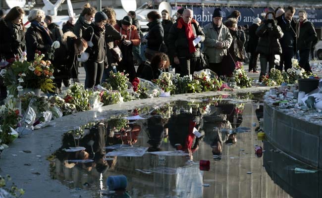 Foreigners Support Their Beloved France on Streets of Paris 