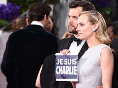 Stars at Golden Globe Awards Support Paris Victims, Free Speech