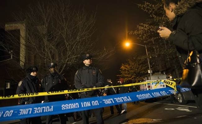Manhunt Under Way For Suspects Who Wounded 2 New York Officers