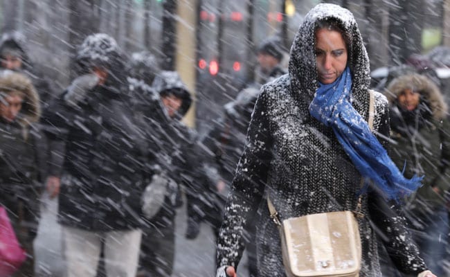 New York City Commuters Hurry Home to Beat the Storm