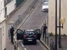 Seven Detained in Hunt For Suspects in Paris Shooting, Say Sources Seven Detained in Hunt For Suspects in Paris Shooting, Say Sources