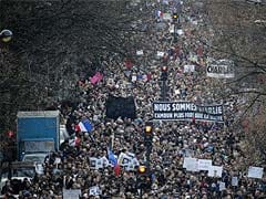 Republican Questions US Low-Profile at French March