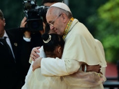 Weeping 12-Year-Old Moves Pope to Take Her Into His Arms
