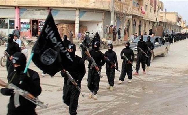 Man, Girl Parade Outside UK Parliament With Islamic State Flags