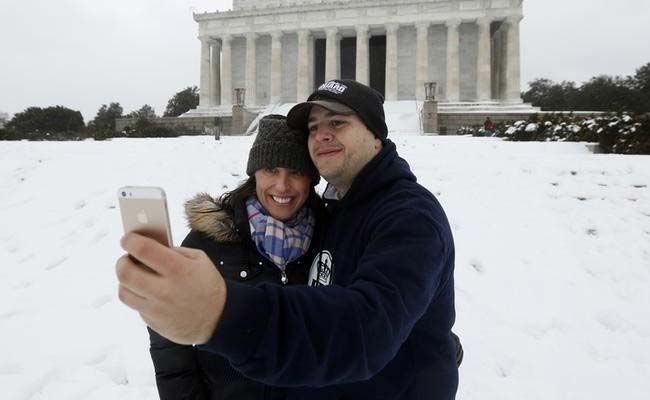 Selfie Sticks: Tourist Convenience or Purely Narcissi-Stick? 