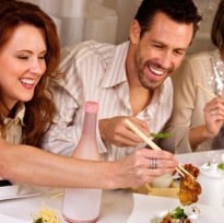 Why Eating With Other People Makes Us Fat