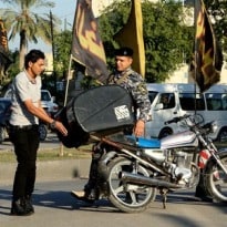 The Many Dangers of Delivering a Pizza in Baghdad