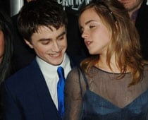 Radcliffe finds 'vigorous kisser' Emma a bit of animal 
