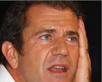 Mel Gibson admits slapping girlfriend  