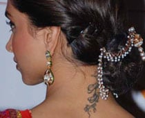 Deepika redesigns the 'RK' tattoo 