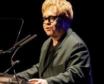 Elton John introduces baby to world