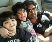 Hrithik busy teaching snowboarding to sons