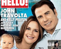 John Travolta, wife show off new baby