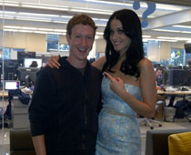 Katy Networks socially with Mark Zuckerberg   